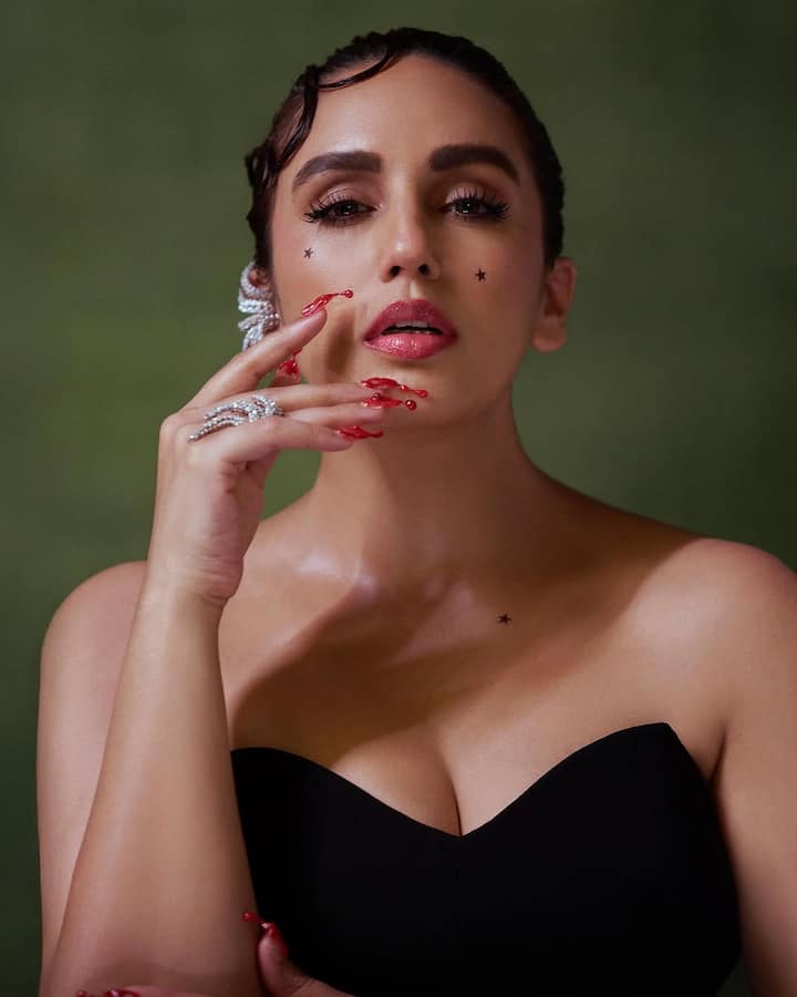 The look was a perfect blend of high fashion and gothic elegance, making a strong statement on the red carpet.