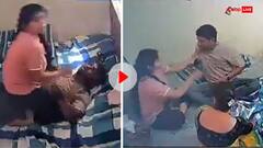 पति की छाती पर बैठकर महिला ने बेरहमी से की पिटाई, लोग बोले- इससे अच्छा जेल में ही डाल दो