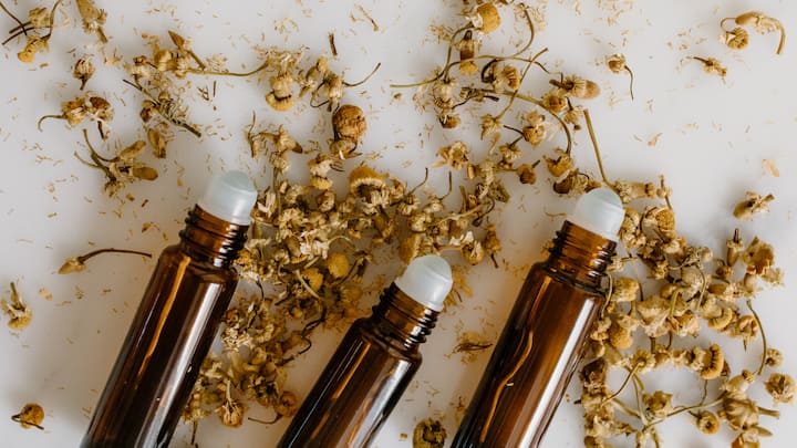 5. Try Aromatherapy: Essential Oils have a powerful effect on relaxation. Light a scented candle, diffuse essential oils, or use a calming mist. Lavender, chamomile, and eucalyptus are some of the great essential oils that help promote relaxation and reduce stress. These essential oils create a soothing ambiance which positively affects the mood. (Image Source: Canva)