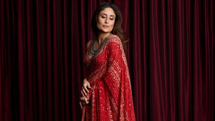 Kareena's luxurious red saree with detailed gold embroidery is a classic pick for Ram Navami puja. The earthy hue complements her glow, and her emerald necklace gives it a royal touch, making it an ideal festive outfit. (Image Source: Instagram/ kareenakapoorkhan)