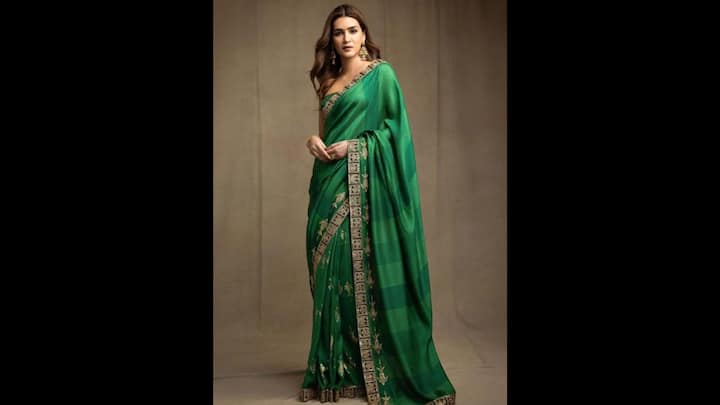 2. Kriti Sanon: Kriti Sanon wore a dual green shaded silk saree that featured gold embroidery along the border. She paired her saree with a noodle strap blouse that added a modern touch. The actress completed her look with traditional statement gold jewellery that elevated her look. (Image Source: Pinterest/connectmyindia10)
