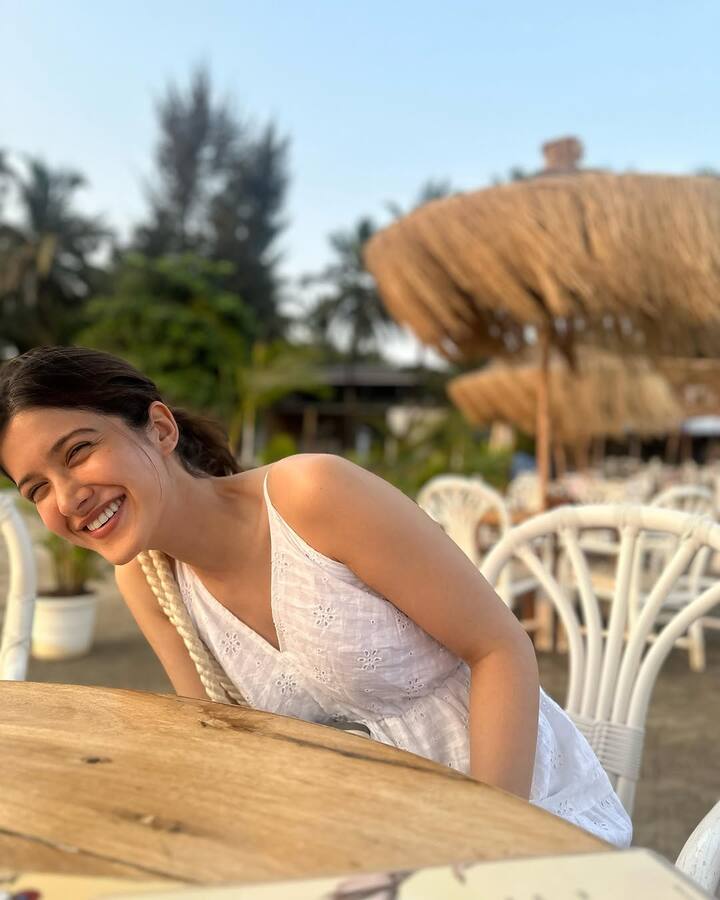 In one photo, Shanaya is seen enjoying a quiet moment in comfy loungewear, standing amidst lush greenery.