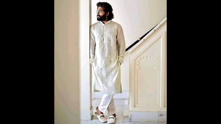 7. Regal White Look: Allu Arjun served an effortlessly royal look in an embroidered white kurta which he paired with a matching churidar. The South Indian actor wore white loafers for a modern look. The intricate patterns added charm to his classic traditional attire that he accessorised with sunglasses. (Image Source: Pinterest/@pavanchikkireddy143)