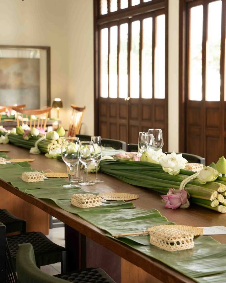 The third original structure was transformed into an elegant cocktail bar set in the villa’s lush garden, adding to the estate’s chic atmosphere.