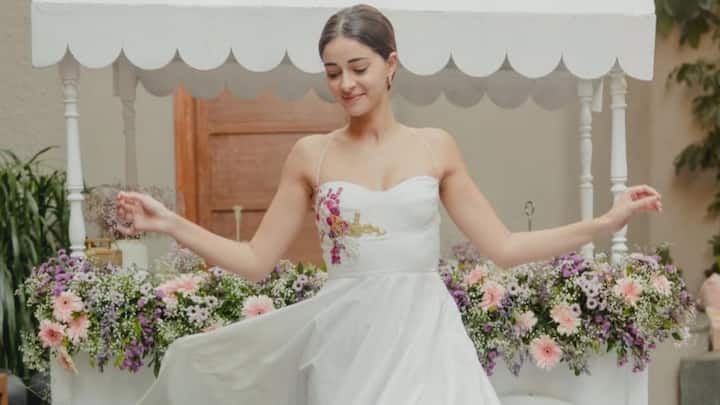 Embroidered Halter Dress: The adorable halter criss-cross cotton dress by Ananya sported soft embroidered accents in magenta and gold. Modern with its sweetheart neckline and sleek design, this kind of fabric is lightweight and airy for hot days. (Image Source: Instagram/ ananyapanday)