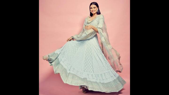 2. Athiya Shetty: Athiya Shetty wore an elegant lehenga that had a pastel hue. Her traditional outfit featured stunning embroidery and a delicately scalloped dupatta. The dupatta also had a sheer fabric and golden detailing which enhanced the look. The ethnic attire had a regal charm that's ideal for any festive occasion. (Image Source: Instagram/@rahulmishra_7)