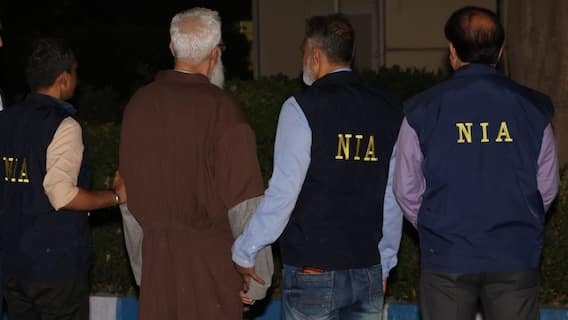 Tahawwur Rana's First Photo In NIA Custody Surfaces: Brown Outfit, White Hair
