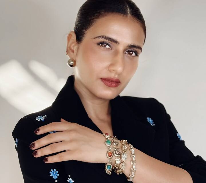 Fatima Sana Shaikh Radiates Grace In A Black Co-Ord Set, See Pics Fatima chose chunky gold bangles with colourful gemstone accents and bold statement earrings to amplify the co-ord’s elegance.