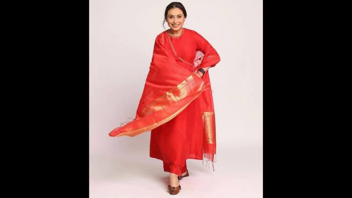 6. Rani Mukherji: Rani Mukherji wore a red traditional outfit that's considered to be auspicious for puja events. The bright red outfit had a rich dupatta with golden zari detailing. The actress radiated grace and festive energy with her outfit, making it perfect for puja. (Image Source: Instagram/@ranimukherjeeeofficial)