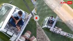 'यमराज के साथ उठना-बैठना है', नदी में गिरा ट्रक तो छत पर बैठकर तंबाकू रगड़ने लगा शख्स, वीडियो वायरल