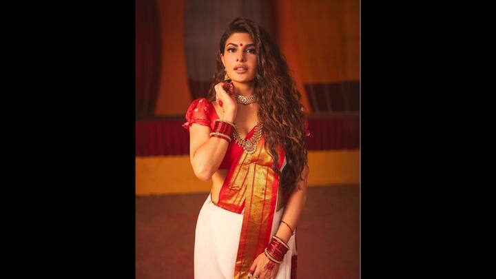 6. Jacqueline Fernandez: Jacqueline looked ethereal in her elegant saree that had red detailing. She complemented her saree with traditional red blouse and statement jewellery. Her look blended grace with the spirit of festivity, that made her outfit ideal for Pohela Boishakh celebrations. (Image Source: Pinterest/pmlroy)