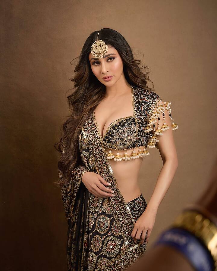 After making a mark with Brahmāstra: Part One – Shiva, Mouni Roy is all set to be seen next in The Virgin Tree, a horror-comedy film alongside Sunny Singh and Sanjay Dutt. The film promises to showcase a new facet of Mouni’s versatility on screen, and fans can’t wait for this quirky venture. (All Pics Credir: Instagram/@imouniroy)