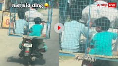 मुर्गी वाली जाली के अंदर बिठा दिए दो बच्चे, बाइक सवार का वीडियो जमकर हुआ वायरल