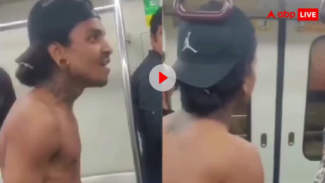 Man was seen taking off his clothes in Delhi Metro and provoking a passenger for a physical fight video viral दिल्ली मेट्रो में कपड़ा फाड़ लड़ाई! शर्ट उतारकर धमकी देने लगा शख्स, जमकर वायरल हो रहा वीडियो
