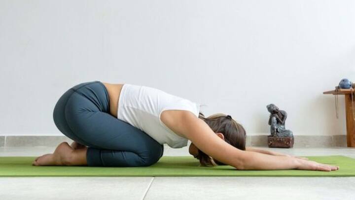 1. Balasana (Child's Pose): This is a gentle pose that can ease tension in the back, hips, and shoulders. It helps in relaxing the body. Balasana doesn't put any pressure on joints or muscles, making it ideal for people with haemophilia. It helps in reducing stress and supporting overall well being without risking injury. (Image Source: Pinterest/freepik)