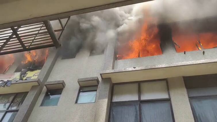 Massive Fire Erupts Near Anupam Cinema, Khokhara, Lakhs Lost in Ahmedabad Apartment Blaze અમદાવાદમાં વધુ એક આગનો બનાવ: ખોખરામાં અનુપમ સિનેમા પાસે એપાર્ટમેન્ટમાં ભીષણ આગ, લાખોનું નુકસાન