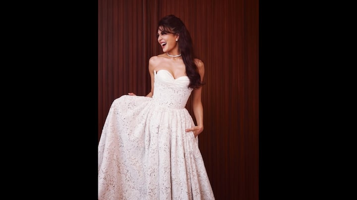 7. Ethereal Lace Dress: Jacqueline Fernandez wore a dreamy strapless gown that featured delicate lace detailing and a sweetheart neckline. The voluminous outfit added a charming look. Jacqueline paired her gown with classy, minimal diamond jewellery that completed her look with grace. (Image Source: Instagram/@jacquelienefernandez)
