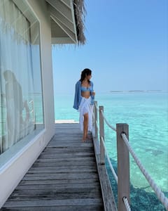 Neha Sharma Channels Beach Goddess Vibes In White Swimsuit In Maldives, See Pics