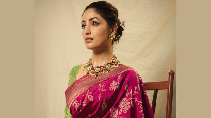 Yami looked regal in this rich Banarasi saree with a contrasting yellow-green blouse, which gave a very bold and festive look.  (Image Source: Instagram/ yamigautam)