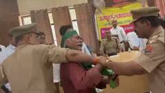 अलीगढ़ में अधिकारियों के सामने किसान ने की आत्मदाह की कोशिश, सुरक्षाकर्मियों ने ऐसे बचाई जान