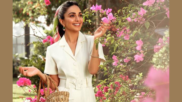 Kiara's strappy white jersey dress is complete with ruching details, and a sheer floral trim simply makes it phenomenally glamorous. This one can easily be flaunted for those summer brunches or bright-day get-togethers. (Image Source: Instagram/ kiaraaliaadvani)