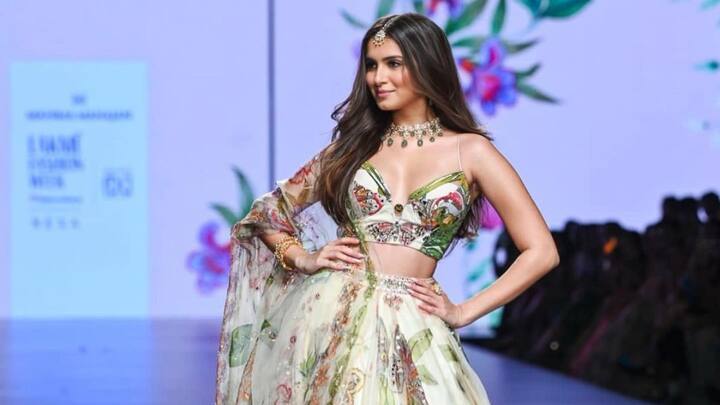 Tara's floral-printed lehenga is a breather with its softer hues and nature-inspired motifs. Great for daytime functions, this look is stylish yet relaxed.  (Image Source: Instagram/ tarasutaria)