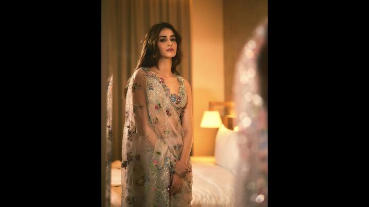3. Enchanting Floral Saree: Ananya Panday exuded elegance in a delicate saree that had floral embroidery and a subtle shimmer. The soft and sheer material of the saree gave a graceful look. Her blouse had heavy embroidery work that enhanced her look. (Image Source: Instagram/@ananyapanday)