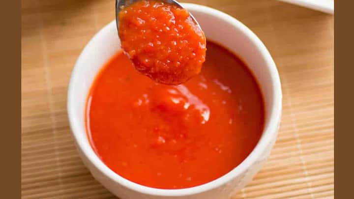 Bhut Jolokia Sauce: Remember Bhut Jolokia, the chilli once touted as the hottest in the world? It has now been transformed into sauces, and for the faint of heart, approach with caution! This sauce is unforgettable, and for good reason: it is fiery. From all over the world, spice lovers are obsessing over small-batch Bhut Jolokia sauces, turning them into a culinary must-have gem. (Image Source: Twitter/ jalapenomadness)