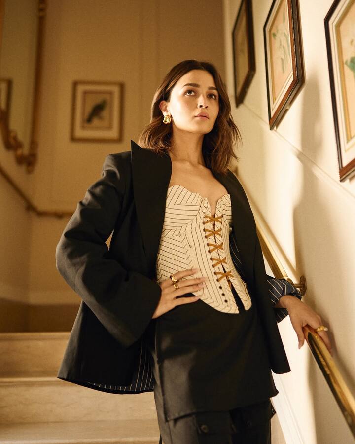 Alia Bhatt stunned in a striking beige and ochre corset designed by Yash Patil, which featured criss-cross stripes. (Image: Instagram/@aliaabhatt)