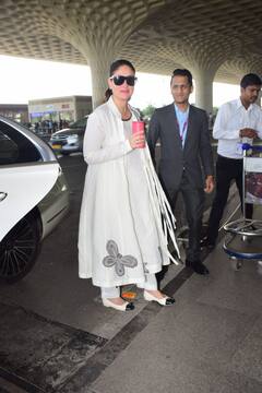 व्हाइट सूट...आंखों पर चश्मा पहने एयरपोर्ट पर स्पॉट हुईं करीना कपूर, सादगी से लूटी महफिल