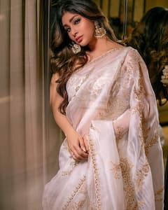 Mouni Roy Radiates Elegance In A Dreamy White & Gold Saree, See Pics