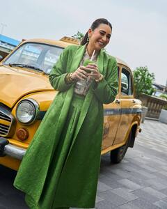 Karisma Kapoor’s Leafy Green Elegance Meets Vintage Taxi Vibes, PICS