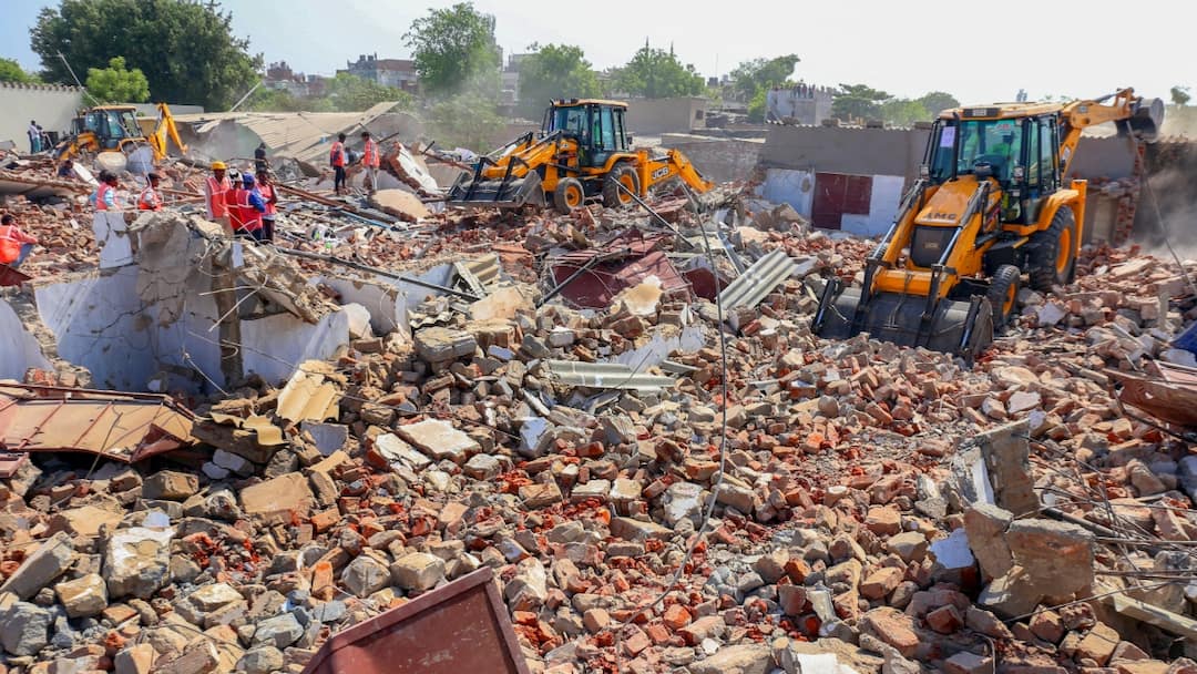 Gujarat News Large-Scale Bulldozer Action In Ahmedabad, Authorities Raze Illegal Bangladeshi Settlement Large-Scale Bulldozer Action In Ahmedabad, Authorities Raze Illegal Bangladeshi Settlement