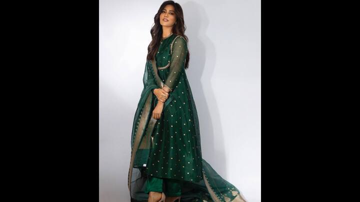 6. Classic Green Anarkali: Chitrangda Sigh exuded a traditional charm in her rich emerald green Anarkali set. Her outfit had gold polka dots all over it which enhanced the look. The sheer border of her kurta set was adorned with zari borders, making the outfit ideal for festivities. (Image Source: Instagram/@chitrangda)