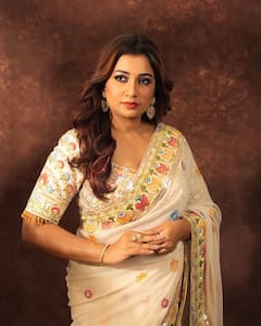 Shreya Ghoshal Dazzles In Ivory Elegance: A Closer Look At Her Regal Saree Look