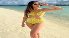 Raai Laxmi Photo: યલો બિકીનીમાં દરિયા કિનારે રાય લક્ષ્મીએ ફ્લોન્ટ કર્યું કર્વી ફિગર