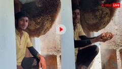 शख्स ने मधुमक्खी के छत्ते में डाल दिया हाथ! खतरनाक स्टंट देख आप भी सिहर उठेंगें, देखें वीडियो