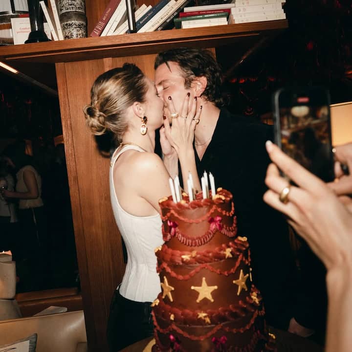 Among them was a romantic shot of her kissing Cooper — marking their first public acknowledgment as a couple after nearly a year of dating.