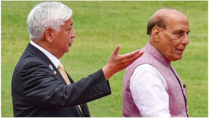 Japanese Defence Minister engaged in discussion with Indian counterpart during their walk at the ceremonial reception. (Image Source: PTI)