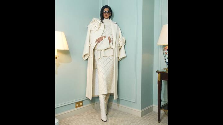 7. Oversized Winter Look: Sonam Kapoor exuded winter glam in an all-white outfit. Her fit featured quilted textures, and oversized coat adorned with floral appliques, and knee high matching boots. The actress added colour to the monochromatic look by adding golden jewellery and chich oversized sunglasses. (Image Source: Instagram/@sonamkapoor)