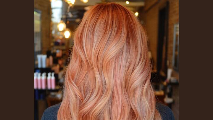 Strawberry Blonde: This playful mix of blonde and light red is ideal for those wanting a soft, sweet hue with a touch of vibrancy. It adds warmth and dimension, perfect for bright summer days. (Image Source: Pinterest/ HairsLondon)