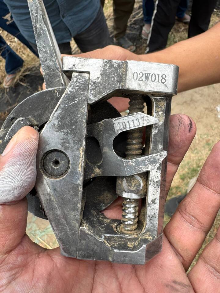 A metal component from the downed Pakistani drones has been recovered from the debris. Security forces have collected the remains and are conducting a thorough analysis to determine their origin. (Image Courtesy:ANI)