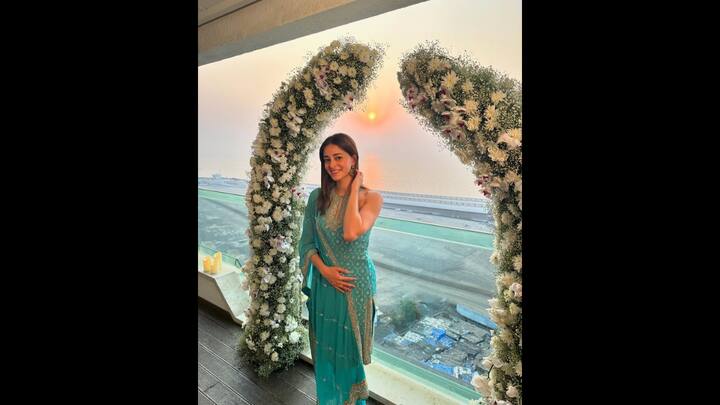 2. Ananya Panday: Ananya Panday looked absolutely stunning in her mother, Bhavana Panday's turquoise suit set. The actress was seen adorning her mother's suit at her cousin's wedding festivities. The sleeveless kurta had gota work and golden embroidery that enhanced the actress's look. Ananya Panday paired a matching dupatta and jewellery with her 21-year old traditional outfit. (Image Source: Instagram/@ananyapanday)