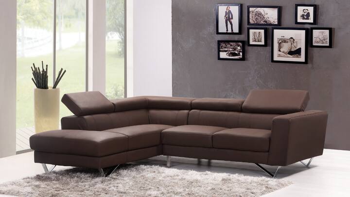 2. Neutral Upholstered Sofas: Every living room must have a sofa, and a neutral colored one enhances the living room’s beauty. Neutrals upholstered sofas in the form of beige, grey, and soft brown fit any color combination and are simple to style. Being accentuated with stylish throws or bright vibrant cushions seasonally is possible. A neutral sofa is perfect for a well-designed sofa as it captures beauty and comfort ensuring proper ease while seating. A living space will always be ready and welcoming in a warm neutral sofa. (Image Source: Canva)