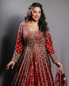 Rupali Ganguly Stuns In Red & Gold Embellished Ethnic Ensemble