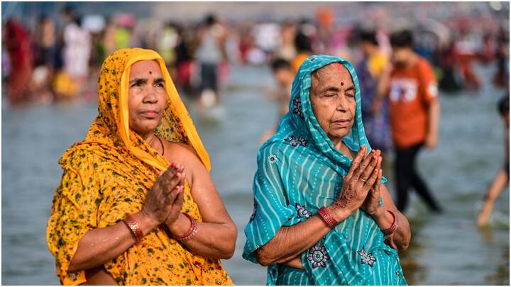 They sought blessings as they took a holy dip in the Sangam river in Prayagraj.  (Image Source: PTI)