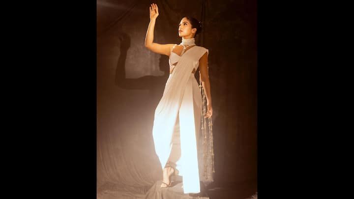 5. Bhumi Pednekar: Bhumi Pednekar make a powerful style statement by perfectly blending modern minimalism with traditional elegance. She draped a sleek saree that featured tailored pants, sleeveless blouse, and a pearl pallu. The actress paired her look with a layered peal necklace that added a regal touch to her minimal look. (Image Source: Instagram/@bhumipednekar)