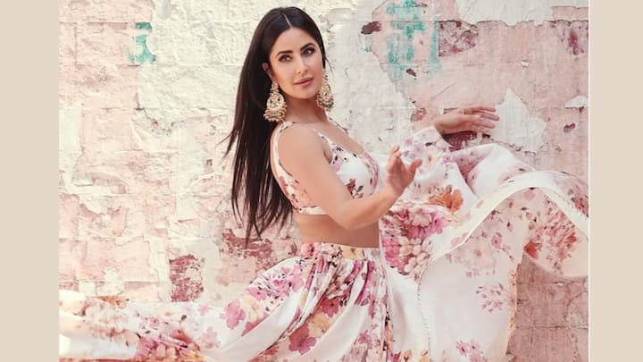 Adding a fresh vibe, Katrina's floral white lehenga set and dupatta are a perfect pick for any wedding wardrobe. Let heavy earrings do the talking, making it perfect for Mehendi and other pre-wedding functions. (Image Source: Instagram/ katrinakaif)