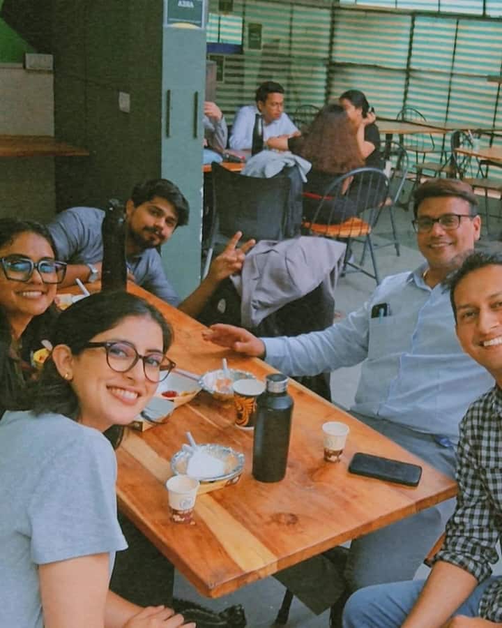 The series of pictures shows Navya in various moods — studious, relaxed, and cheerful — all wrapped in a vibrant college vibe.