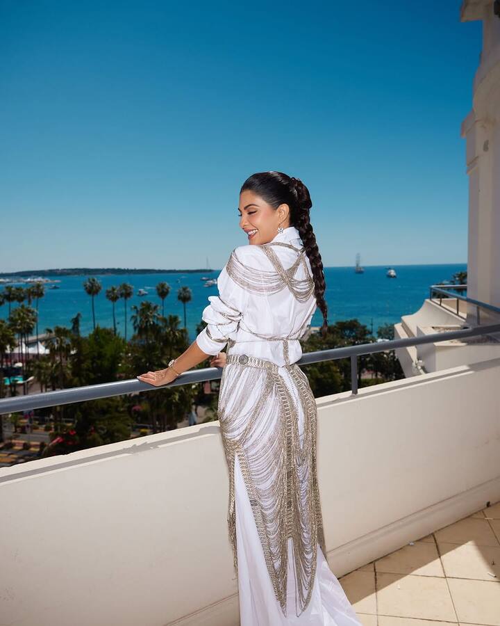 Jacqueline shared pictures from the event on social media, showcasing two striking ivory outfits.